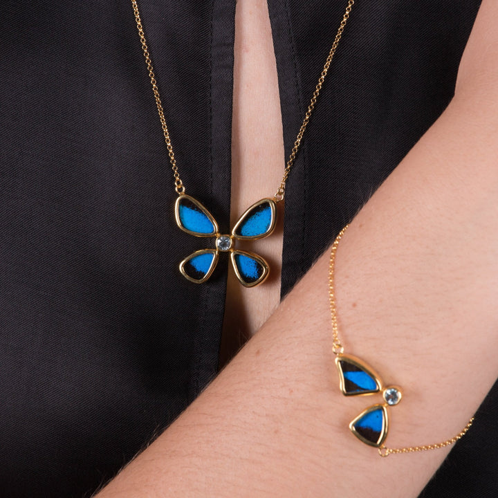 4--A-4B-6F-Gold-butterfly-necklace-with-blue-topaz-birthstone-Royal-Blue-Papilio-Ulysses