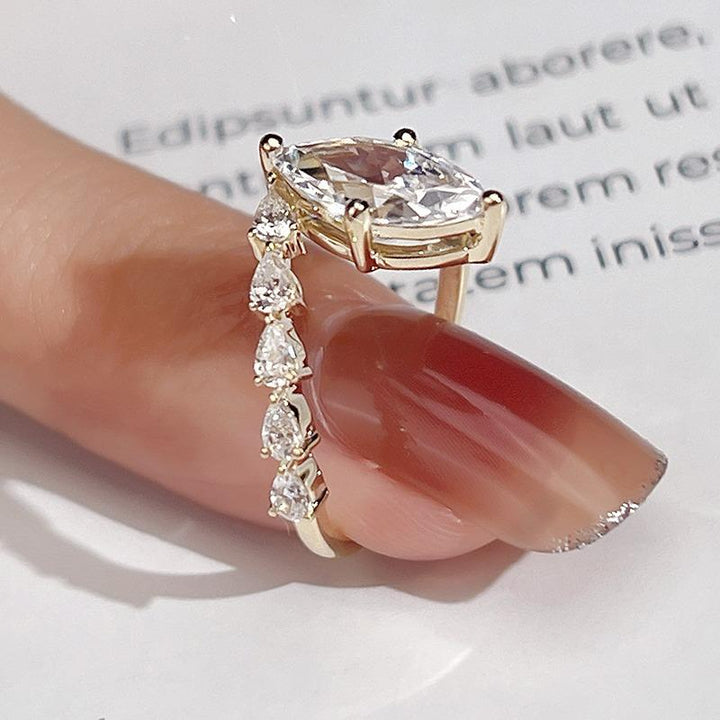 Gold 1ct Marquise Diamond Ring with Side Accents